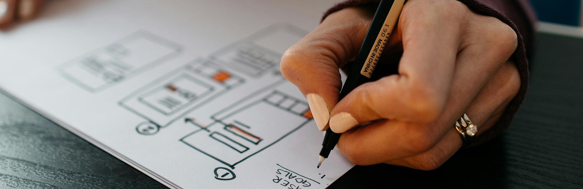 A close up photograph of a paper mobile design layout.