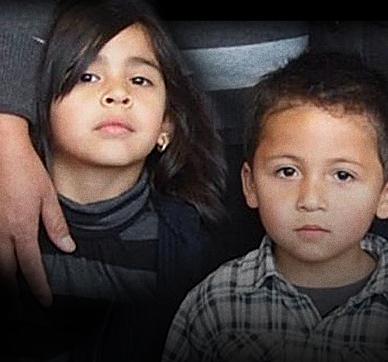 Image of two children standing close shoulder to shoulder representing the support Alliance for Children’s Rights provides.